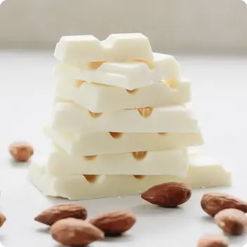 a stack of white chocolate bars.